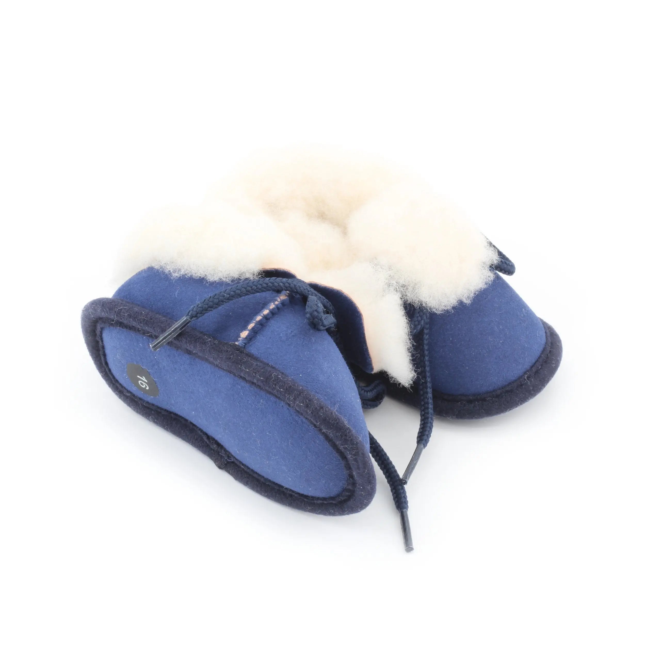 Chaussons bébé bleu en peau de mouton - Dgrandiose